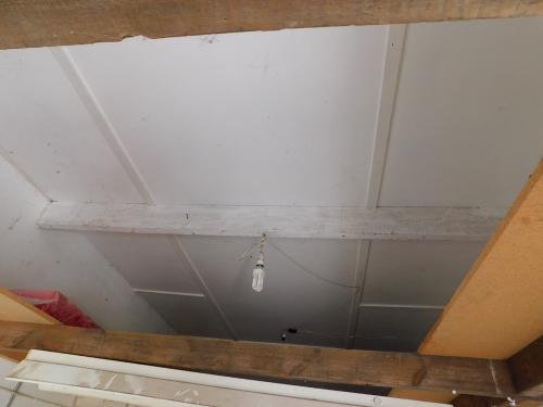 This garage ceiling in Bembridge looks in good order, but was identified as Amosite (Brown Asbestos) which is dangerous. Removal was very expensive